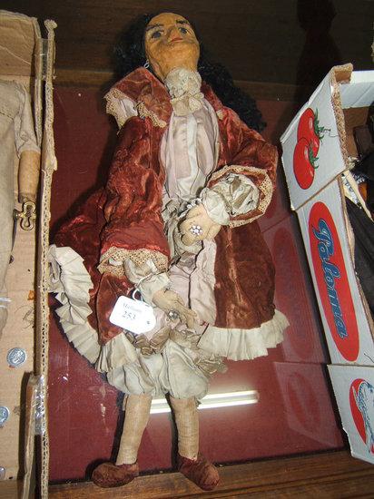 Appraisal: An antique Continental male doll with silk and suede clothing