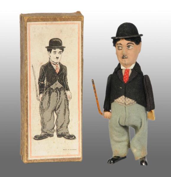 Appraisal: Schuco Charlie Chaplin Wind-Up Toy Description In original box German