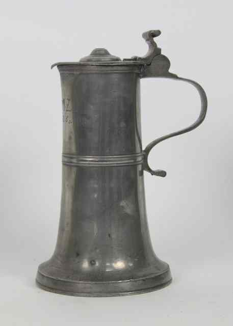 Appraisal: A Swiss pewter lidded flagon initialled SVS and dated within