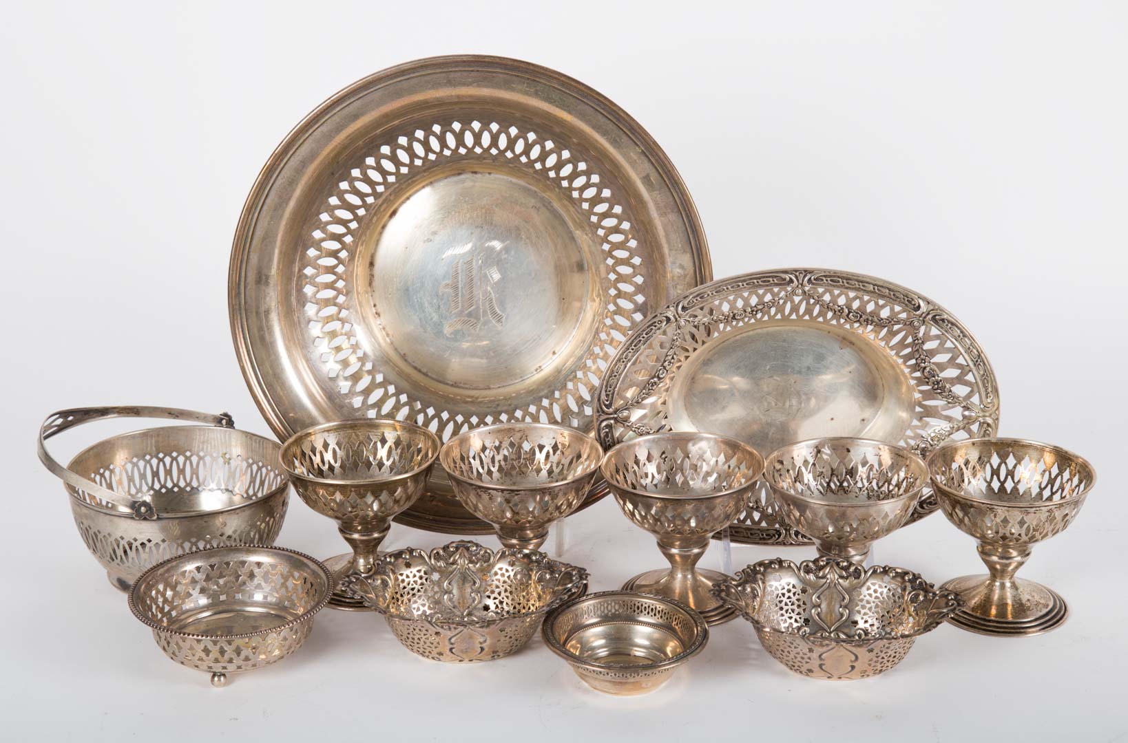 Appraisal: Group of reticulated sterling silver table items including five sherbet