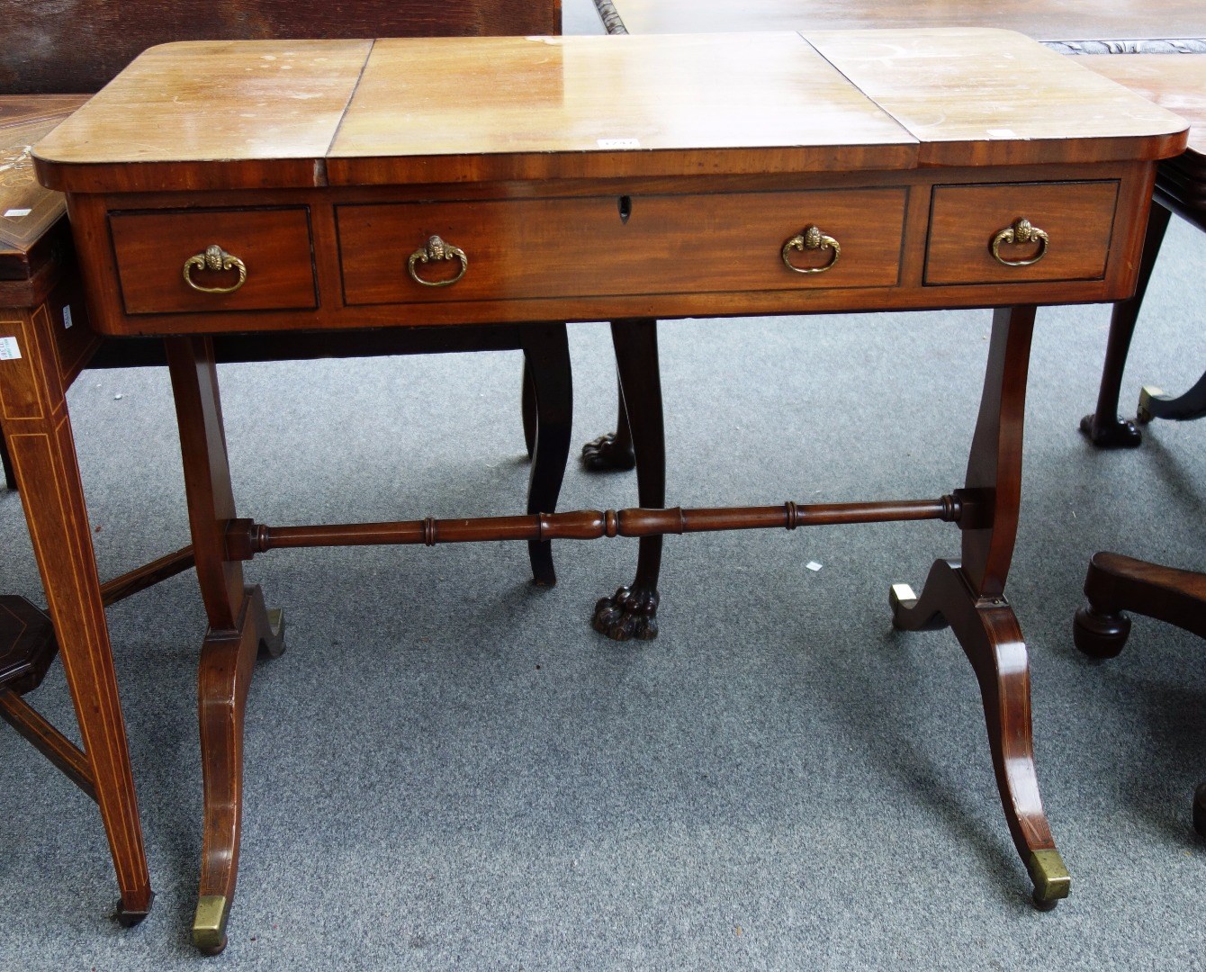 Appraisal: An early th century mahogany writing table the rectangular top