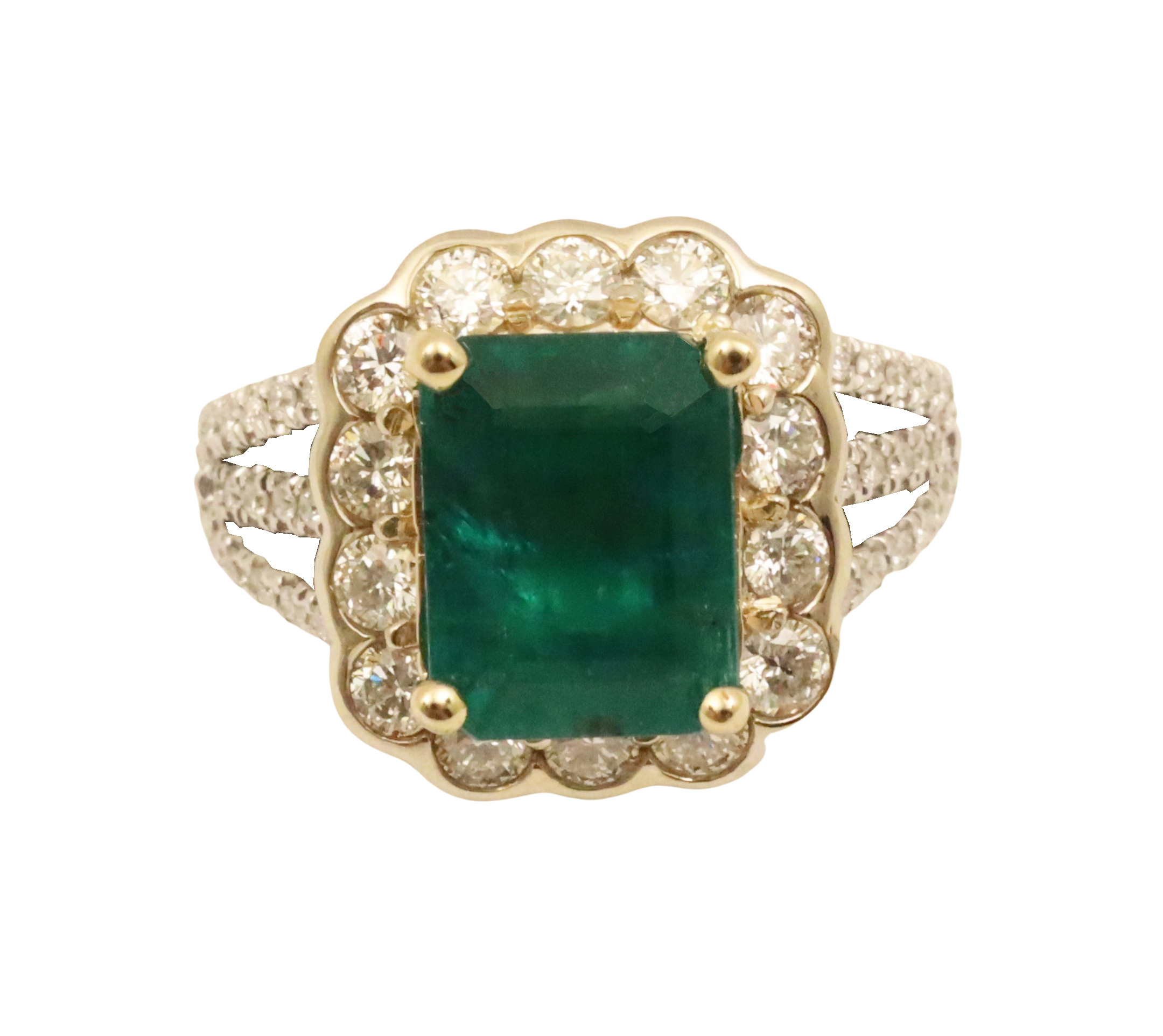 Appraisal: K yellow and white gold emerald and diamond ring having