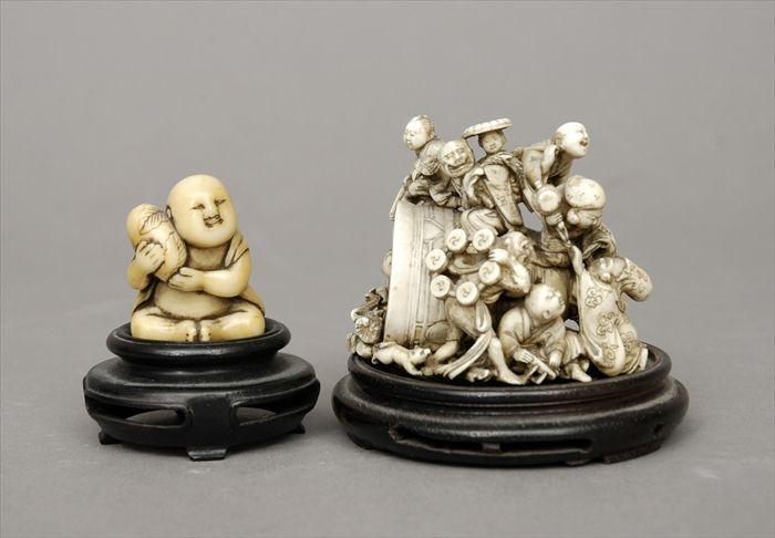 Appraisal: Japanese Carved Ivory Miniature Group of Figures on a Bell