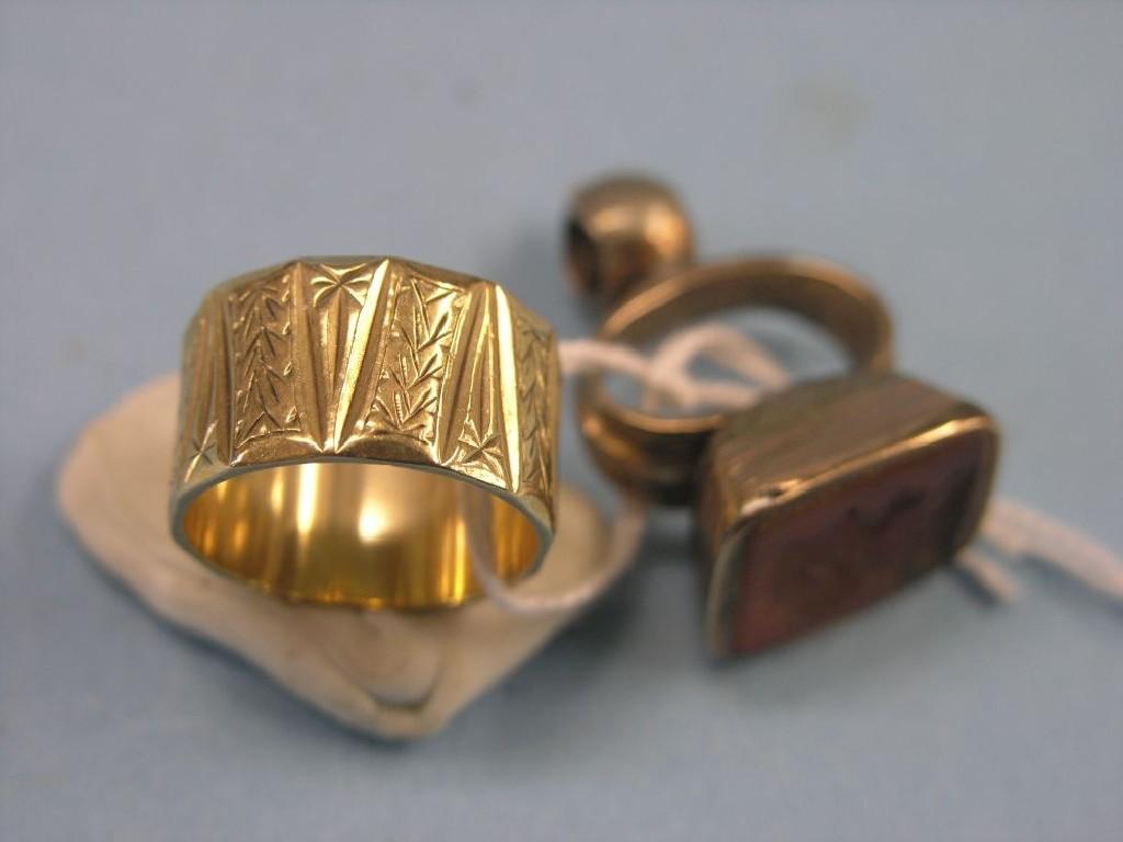 Appraisal: A ct engraved gold ring grams and an intaglio seal