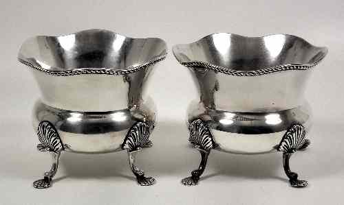 Appraisal: A pair of Edward VII silver bulbous bowls with shaped