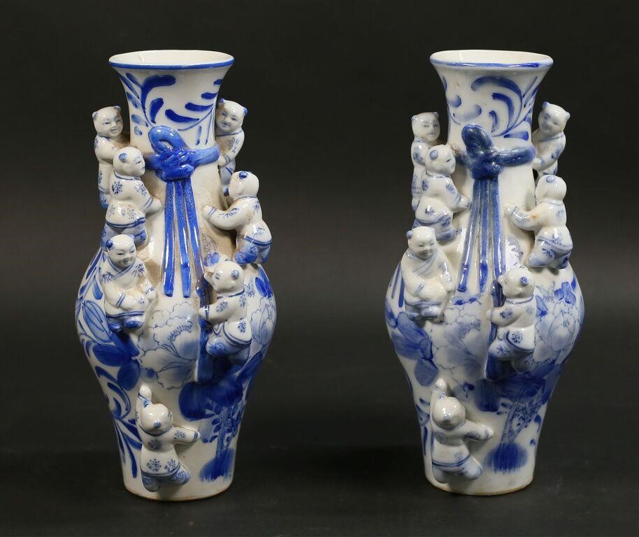 Appraisal: Pair of blue and white Chinese porcelain boys fertility vases