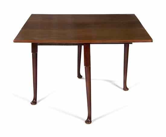 Appraisal: A George III Mahogany Drop-Leaf Table having a rectangular top