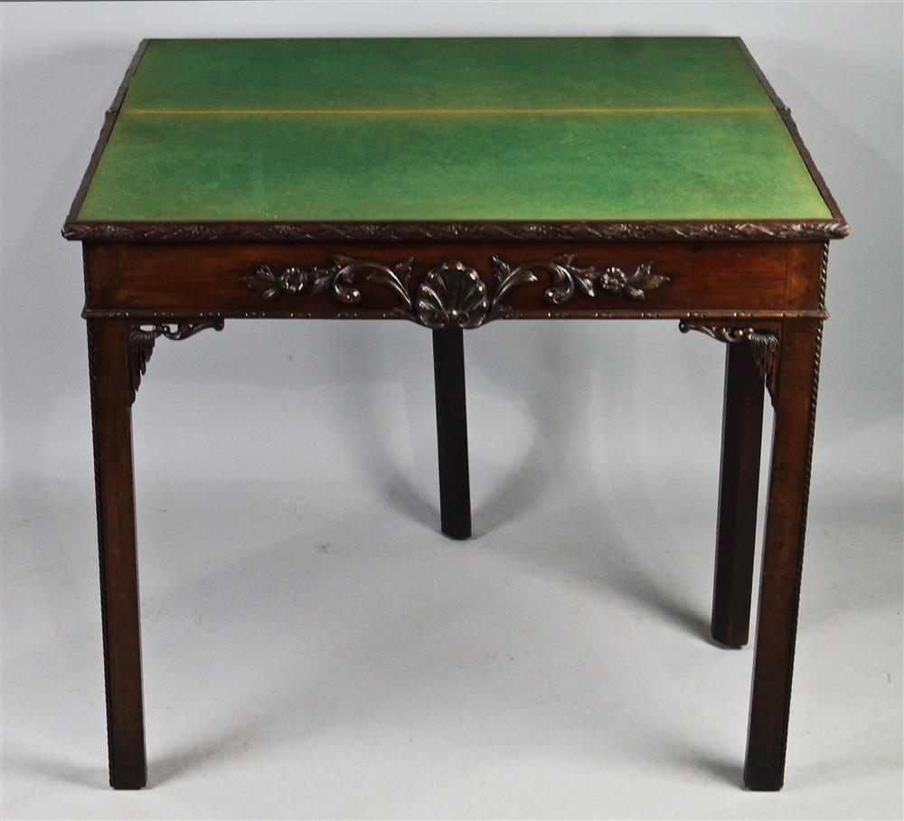 Appraisal: GEORGE III CARVED MAHOGANY CARD TABLE IN THE CHIPPENDALE TASTE