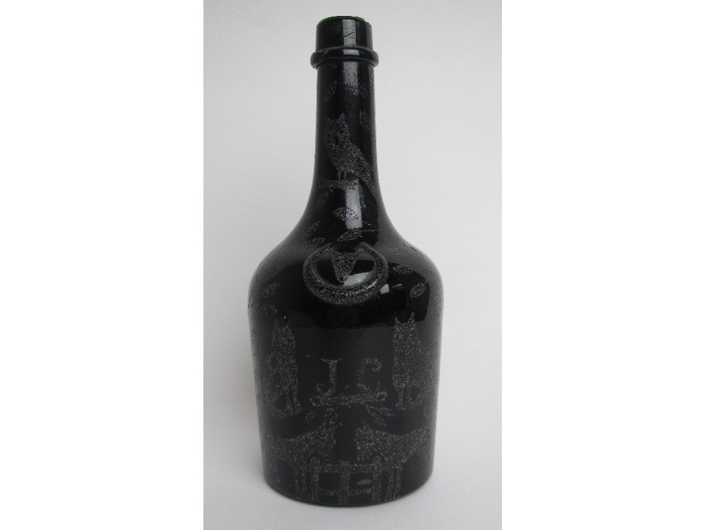 Appraisal: A nail chipped wine bottle decorated with cats dogs donkeys