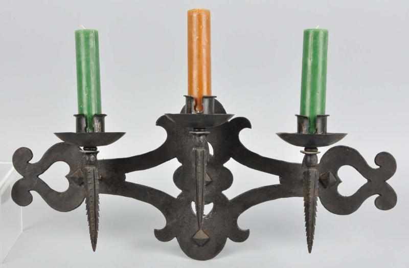 Appraisal: Hand Wrought Arts Crafts Wall Candle Holder Description With three