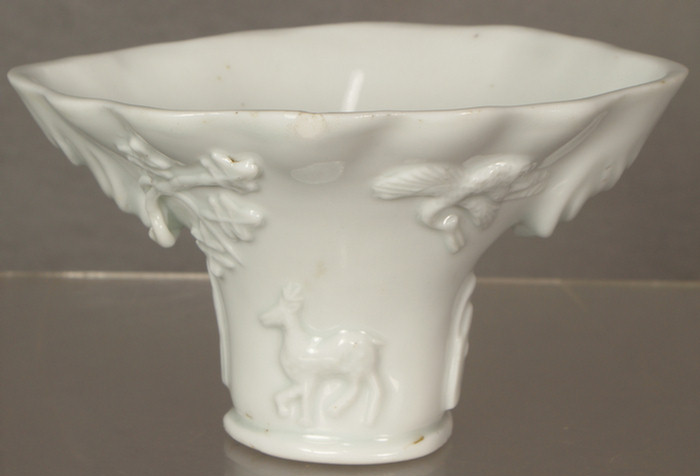 Appraisal: Chinese Blanc de chine libation cup rhinoceros horn form c