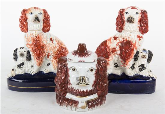 Appraisal: Sale Lot Three Porcelain Figures of Spaniels a pair of