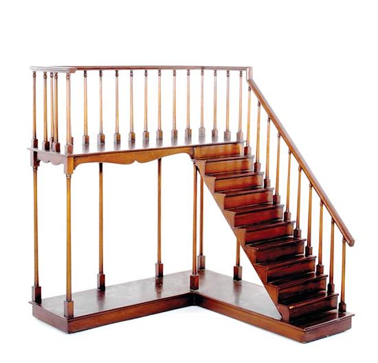 Appraisal: Mahogany whatnot shelf turned baluster railing surrounding landing and continuing