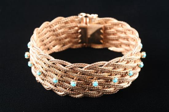 Appraisal: K YELLOW GOLD AND TURQUOISE BRACELET Woven mesh herringbone style