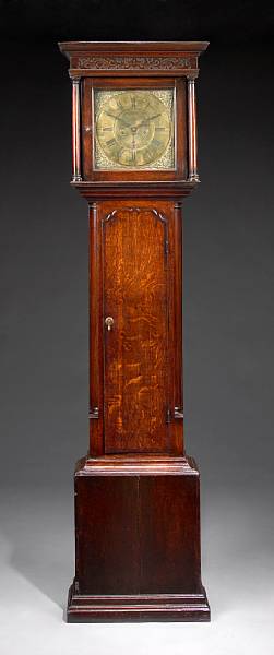 Appraisal: A George III mahogany crossbanded oak tall case clock Thos