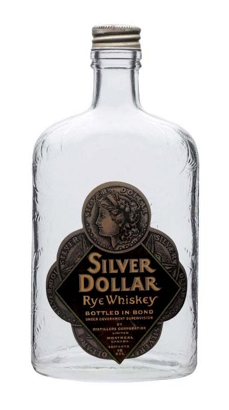 Appraisal: Silver Dollar Rye Whiskey Bottle Paper label Nice image Excellent