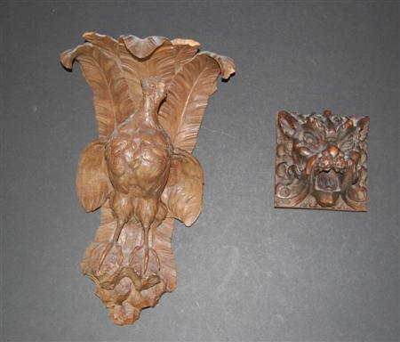 Appraisal: A carved wood bird form wall bracket composed of a