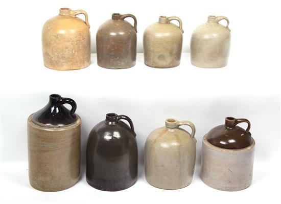 Appraisal: Sale Lot A Collection of Eight Stoneware Whiskey Jugs Height