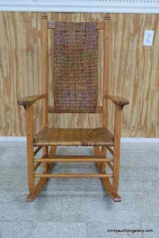 Appraisal: Vintage Maple Wicker Rocking Chairc 's era is a solid