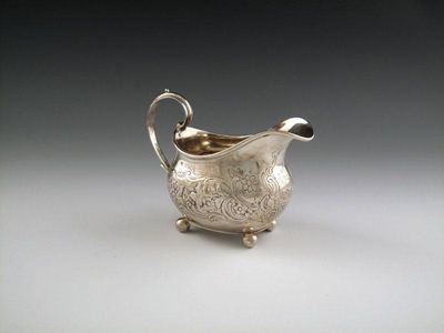 Appraisal: A George IV silver cream jug by Samuel Wheatley London