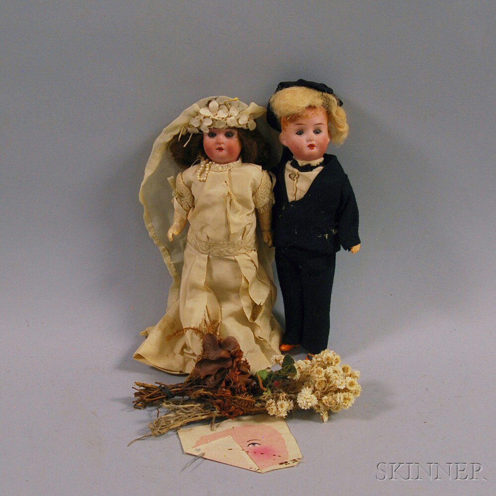 Appraisal: Two DEP Bisque Socket Head Bride and Groom Dolls Germany