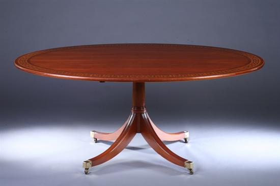 Appraisal: GEORGE III STYLE MAHOGANY OVAL PEDESTAL-BASE DINING TABLE late th