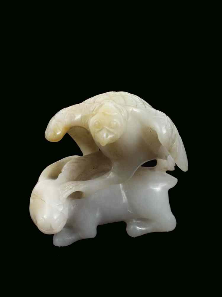 Appraisal: CARVED JADE EAGLE AND HARE - th c carved in