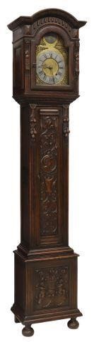 Appraisal: Renaissance Revival carved oak longcase clock th c molded arched