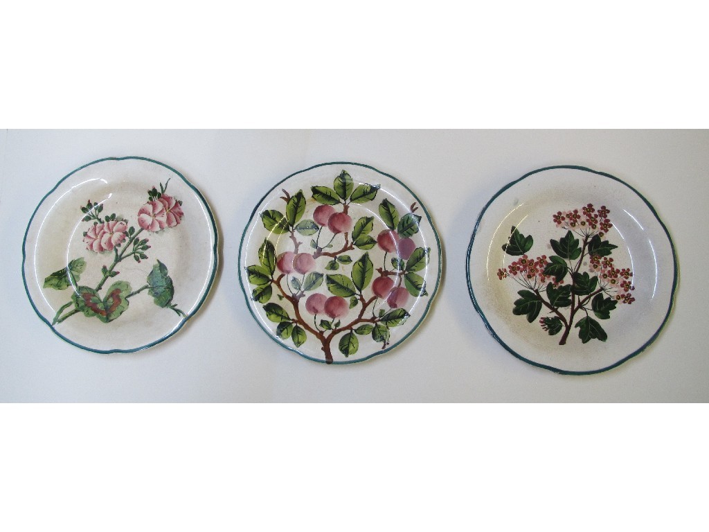 Appraisal: Three Wemyss Gordon plates one painted with geraniums one cherries