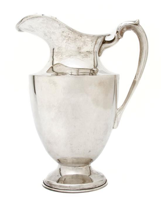 Appraisal: Mexican Sterling Silver Water Pitcher of typical handled form approximate