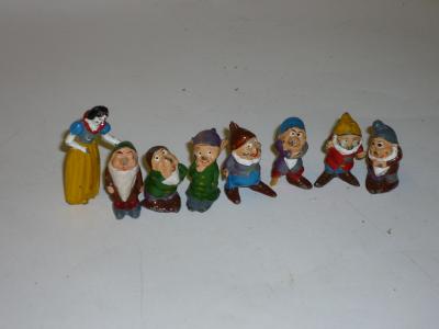 Appraisal: A metal set Snow White and the Seven Dwarfs high