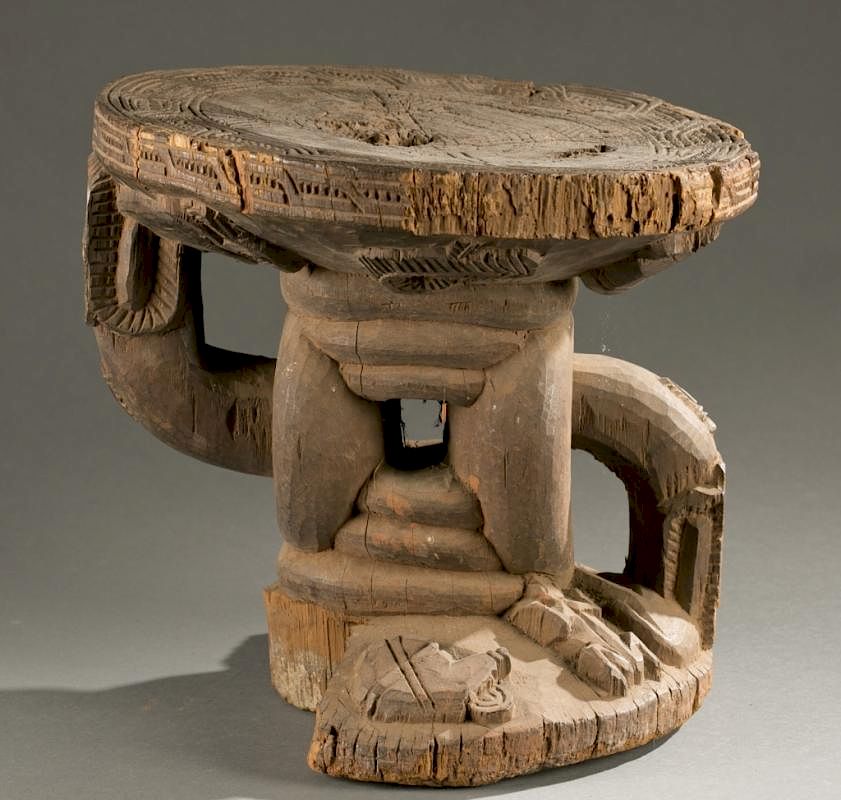 Appraisal: Benin wooden stool th century A wooden stool with an