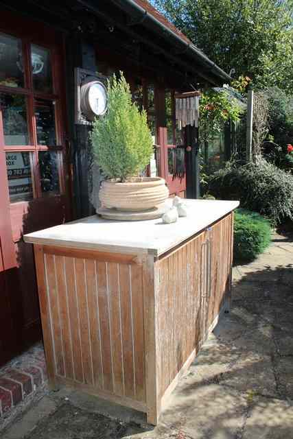 Appraisal: A SHALLOW CIRCULAR TERRACOTTA PLANTER with ribbed decoration diameter x