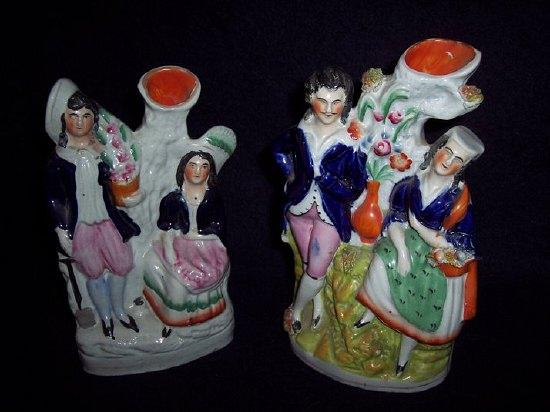 Appraisal: A Staffordshire group gentleman with companion beside a tree cm