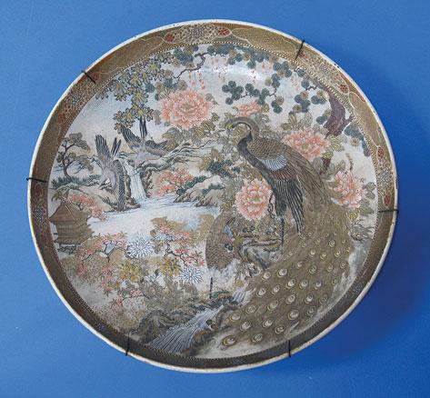 Appraisal: A JAPANESE SATSUMA CHARGER enamelled in polychrome and gilt with