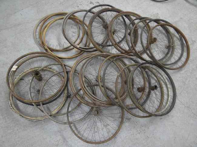 Appraisal: Lot approx misc wooden and clad rims and wheels Poor