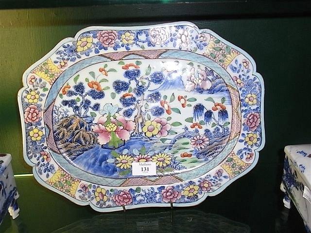 Appraisal: A CHINESE CLOBBERED OVAL DISH with blue mountain landscape and