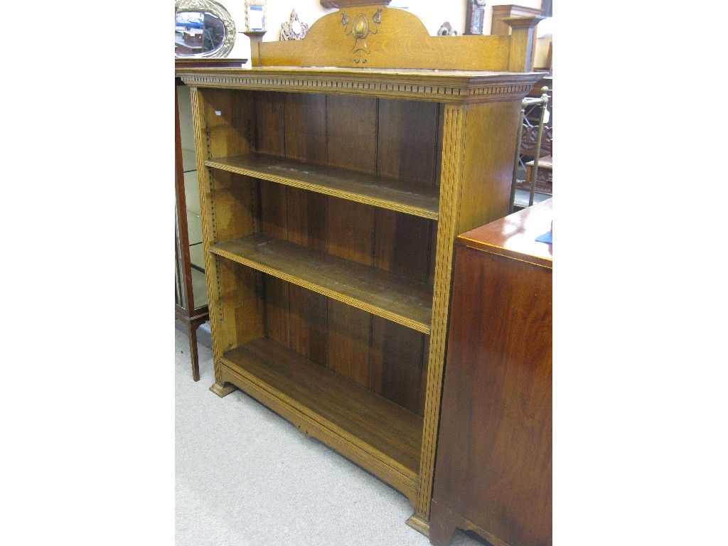 Appraisal: Art Nouveau oak open bookcase