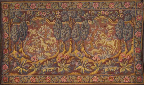 Appraisal: NEEDLEPOINT TAPESTRY Depicting forest scene th C x