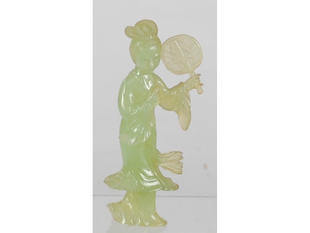 Appraisal: CHINESE CARVED GREEN JADE FIGURE OF A LADY holding a