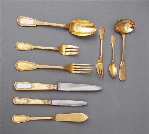 Appraisal: VERMEIL SET OF UTENSILS Paris T tard Consists of forks