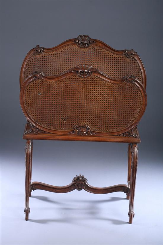 Appraisal: LOUIS XV STYLE CARVED FRUITWOOD FOLIO STAND Double-caned cartouche-shaped panels