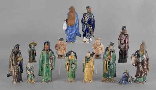 Appraisal: Fourteen Chinese pottery figures tallest -