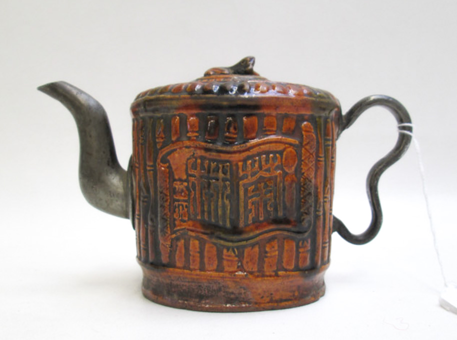 Appraisal: CHINESE POTTERY AND METAL TEAPOT Qing Dynasty having rust glaze