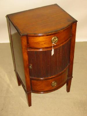 Appraisal: A MAHOGANY BEDSIDE CABINET of bowed form with rosewood crossbanding