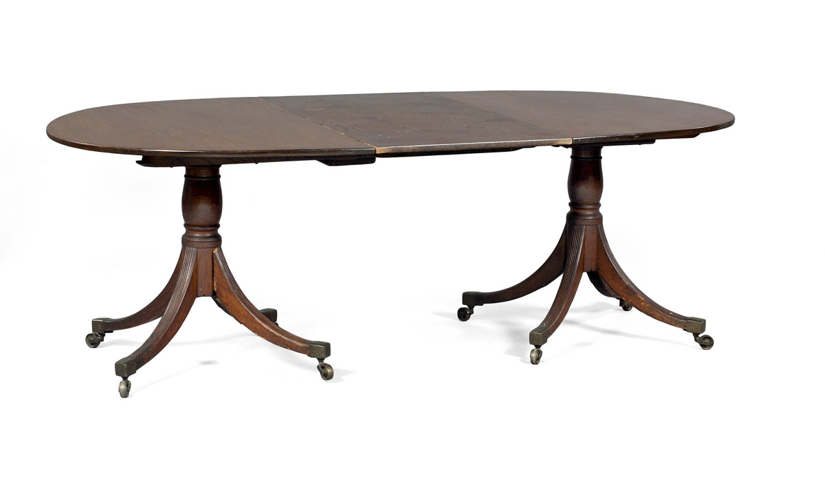 Appraisal: REGENCY MAHOGANY DOUBLE-PEDESTAL DINING TABLE Each section with D-shaped top