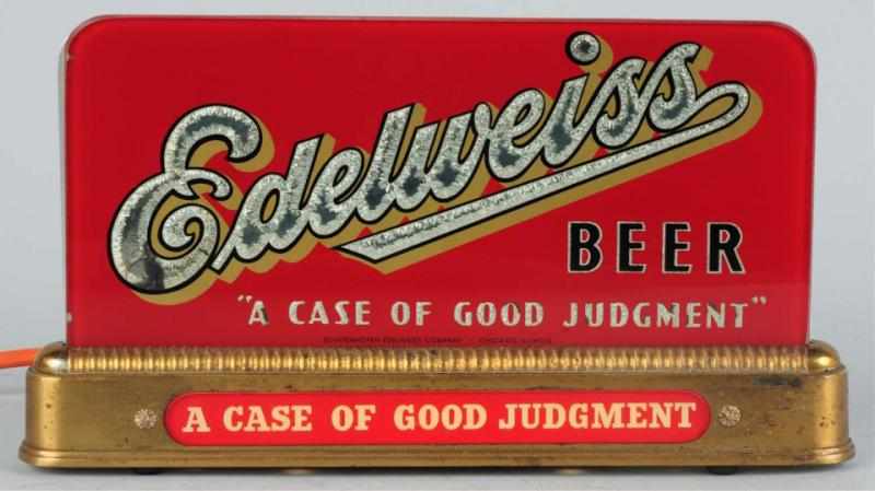 Appraisal: Edelweiss Beer Reverse Glass Light-Up Sign Red paint is in