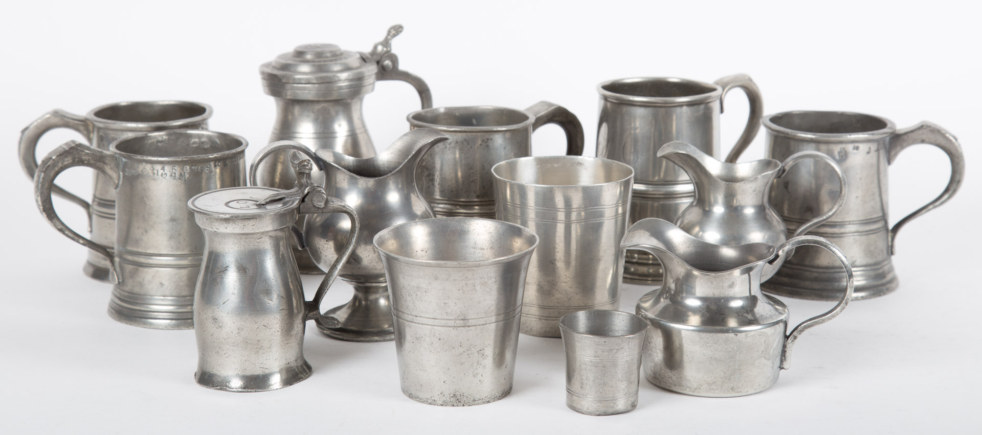 Appraisal: assorted Victorian pewter pieces th century including half-pint tankards miniature