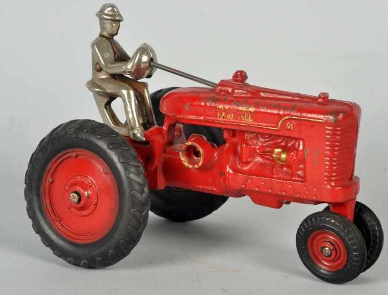 Appraisal: Cast Iron Arcade Farmall Tractor Toy American Black rubber tires