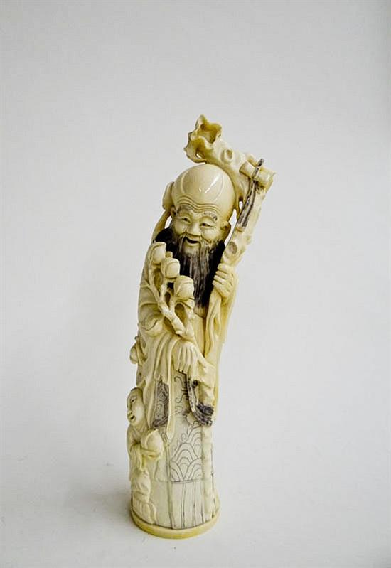 Appraisal: CARVED IVORY FIGURE China early th century God of Longevity